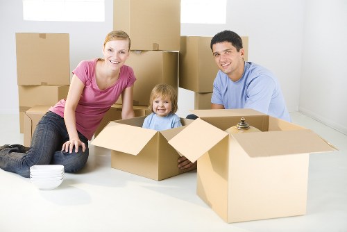 Moving van and packed boxes for a home move in Archway