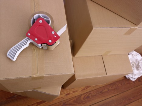 Packed household items ready for removal services in Archway