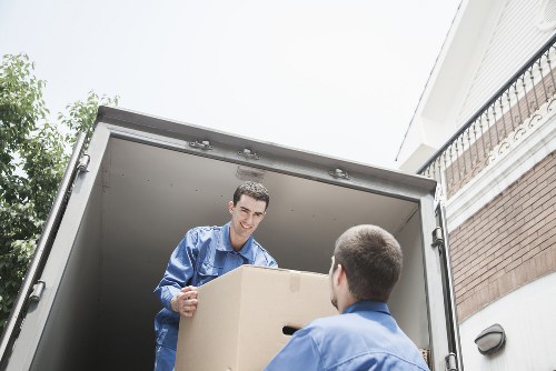 Worker using proper lifting technique during a removal job