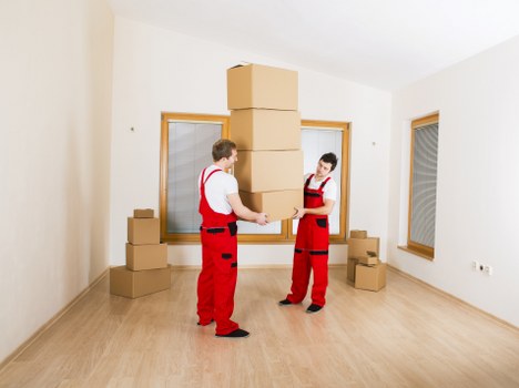 Packed office boxes and equipment ready for transport
